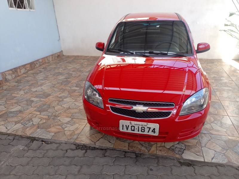 CHEVROLET - CELTA - 2014/2015 - Vermelha - R$ 35.900,00